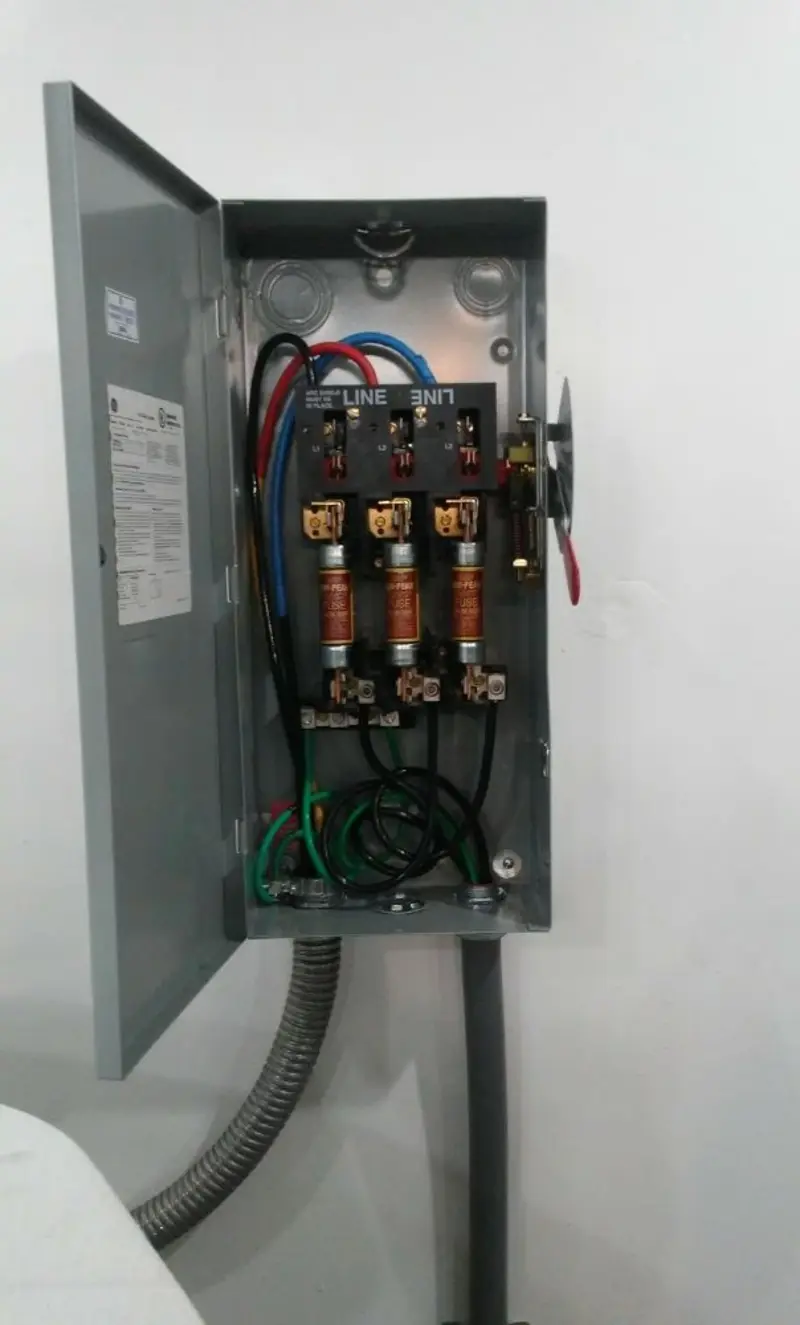 Three-phase disconnect switch installed for Smoke Detector Installation in Circle D-KC Estates